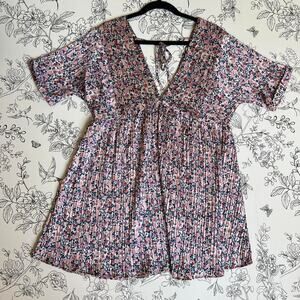 En creme floral mini dress